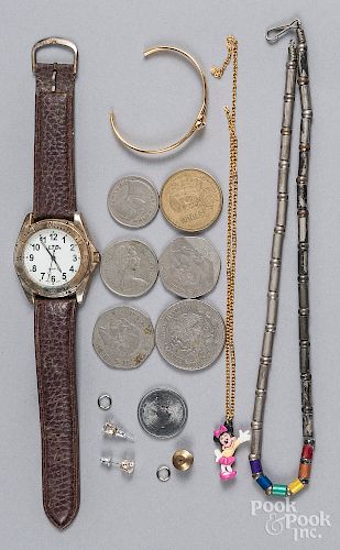 Miscellaneous coins and jewelry.