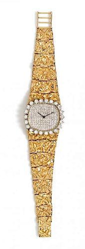 A 14 Karat Yellow and Diamond Wristwatch, 54.25 dwts.
