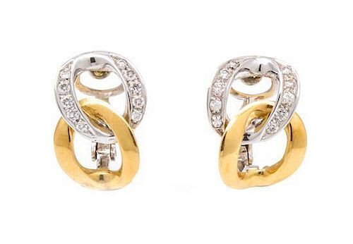 A Pair of 18 Karat Gold and Diamond Earclips, 5.60 dwts.