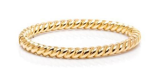 A 14 Karat Yellow Gold Bangle Bracelet, 18.90 dwts.