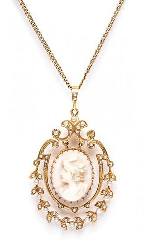 A Victorian Yellow Gold, Seed Pearl and Coral Cameo Pendant, 5.20 dwts.