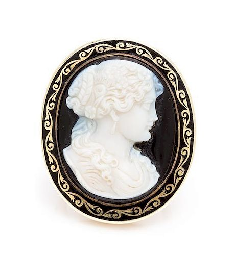 * A 14 Karat Yellow Gold, Hardstone and Enamel Cameo Ring, 11.30 dwts.