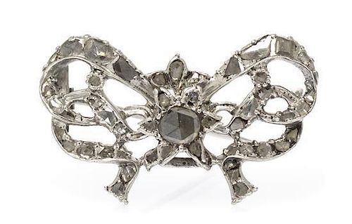 * An Antique Silver and Rose Cut Diamond Bow Brooch, 7.70 dwts.