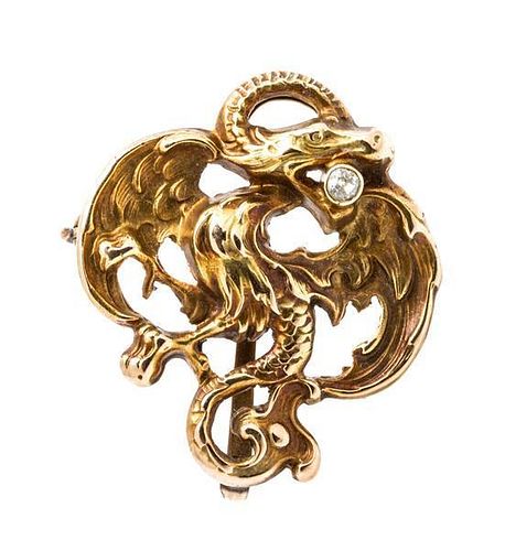 * An Art Nouveau Yellow Gold and Diamond Dragon Brooch, 3.10 dwts.