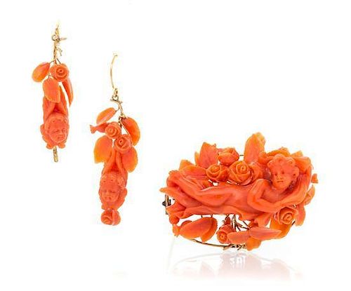 * A Victorian Carved Coral Demi Parure, 14.60 dwts.