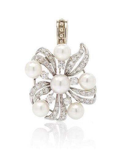 * A 14 Karat White Gold, Cultured Pearl and Diamond Pendant, 5.50 dwts.