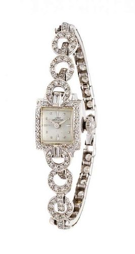 * A 14 Karat White Gold and Diamond Wristwatch, Hamilton, 10.70 dwts.