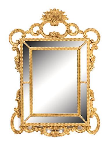 A Louis XV Giltwood Mirror Height 55 x width 38 1/2 inches.