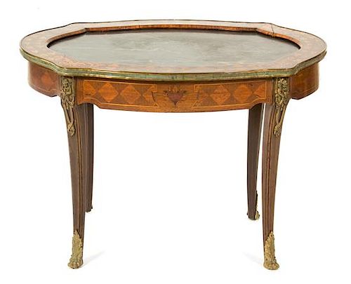 A Louis XV Style Marquetry Inlaid Marble Inset Top Side Table Height 19 3/4 x width 29 3/4 x diameter 21 inches.