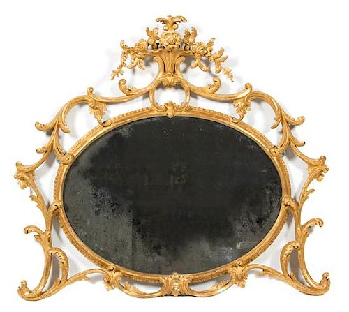 A George III Style Carved Giltwood Mirror Height 37 x width 26 inches.