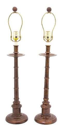 A Pair of Patinated Metal Table Lamps Height overall 31 inches.