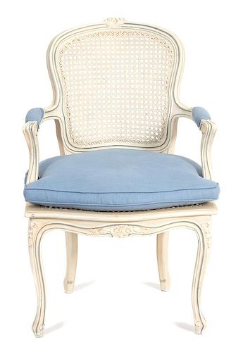 A Louis XV Style Carved and Painted Cane Back and Seat Fauteuil Height 36 inches.