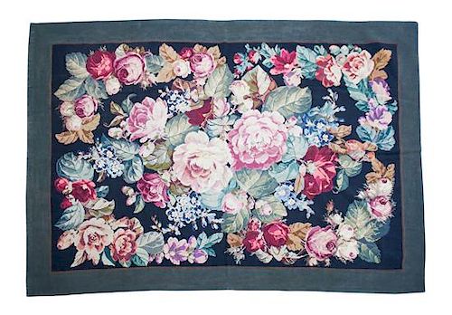 A Floral Needlework Style Rug 75 1/2 x 103 inches.