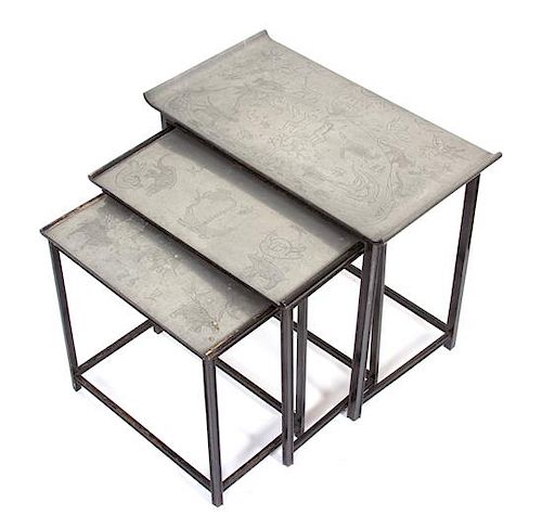 A Nest of Three Chased Pewter Top Tables Height of largest 21 1/2 x 24 x 13 3/4 inches.