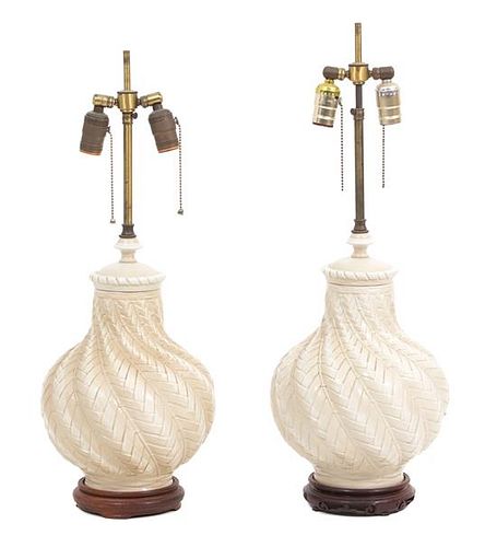 A Pair of Porcelain Lamps with Braided Pattern Height to finial 23 inches.