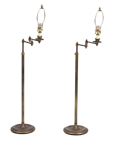 A Pair of Adjustable Brass Floor Lamps Height 57 inches.