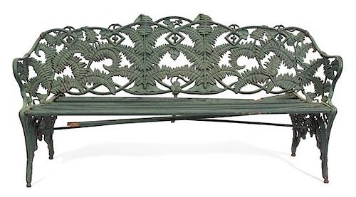 A Painted Cast Iron Fern Pattern Bench Height 36 3/4 x width 75 x depth 21 inches.