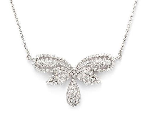 A White Gold and Diamond Bow Motif Necklace, 13.30 dwts.