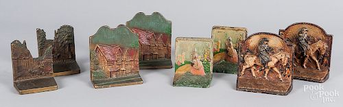 Four pairs of painted cast iron bookends