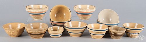 Thirteen small yellowware bowls
