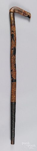 Carved and painted cane