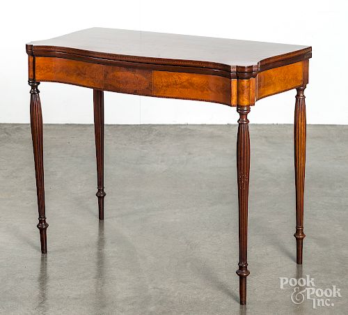 New England mahogany serpentine front card table