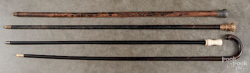 Four assorted canes