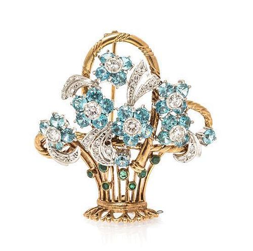 * A 9 Karat Gold, Blue Zircon and Diamond Flower Basket Brooch, 16.60 dwts.