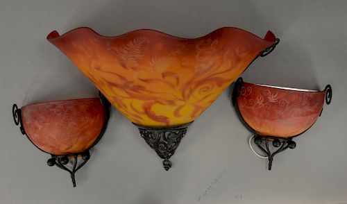 Set of three Ulla Darni modern wall sconces, having reverse painted art glass, matching shades, and wrought iron frames. ht. 12in., ...