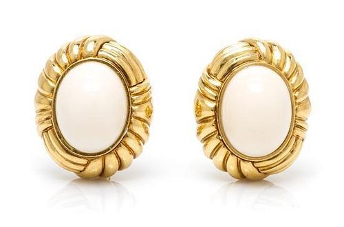 A Pair of 18 Karat Yellow Gold and Coral Ear Clips, 25.80 dwts.