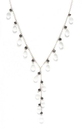 * A 14 Karat White Gold, Moonstone and Black Diamond Bead Necklace, 8.70 dwts.