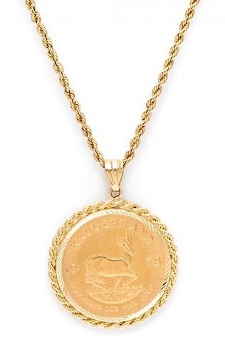 A 14 Karat Yellow Gold and South African Krugerrand Gold Coin Pendant Necklace, 36.40 dwts.