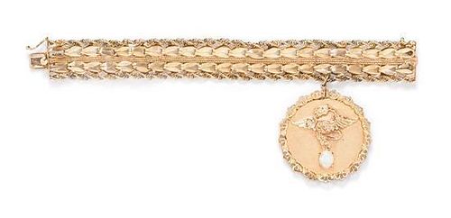 * A 14 Karat Yellow Gold and Opal Charm Bracelet, 25.10 dwts.