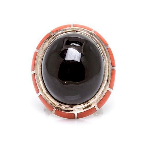 A Sterling Silver, Onyx and Coral Ring, Erte, 15.80 dwts.