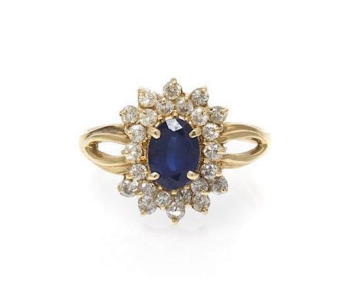 A 14 Karat Yellow Gold, Diamond and Sapphire Ring 2.40 dwts.
