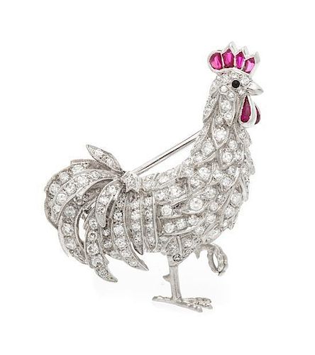 * A Platinum, Diamond, Ruby and Onyx Rooster Brooch, 5.30 dwts.