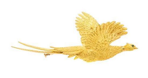 * An 18 Karat Yellow Gold and Emerald Pheasant Brooch, Hermes, 19.30 dwts.