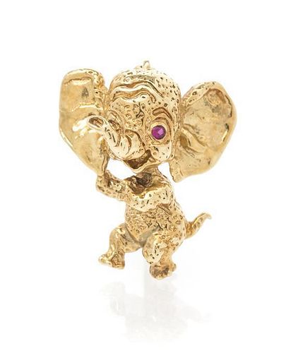 * A Retro 14 Karat Yellow Gold and Ruby Elephant Pin, Ruser, 2.44 dwts.