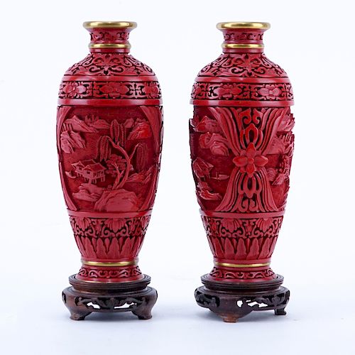 Two Vintage Cinnabar Vases With Stands. Intricately carved village scenes. Brass interior. Unsigned