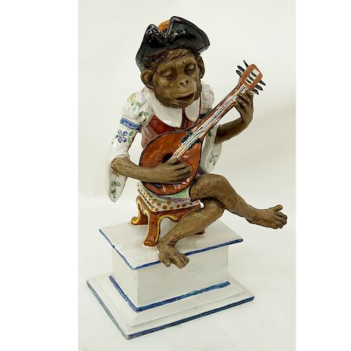Italian Faience Pottery Figurine, Monkey Musical Player. Signed and numbered to base. Small repair 