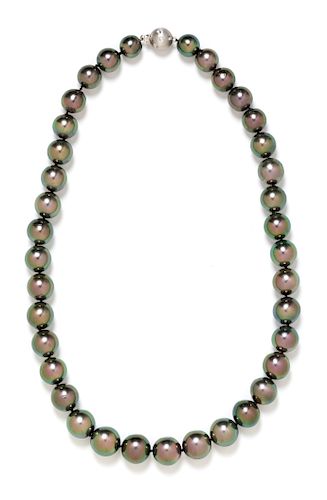 An 18 Karat White Gold, Diamond and Graduated Cultured Tahitian Pearl Necklace, 50.15 dwts.