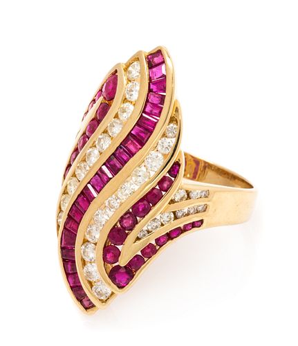 An 18 Karat Yellow Gold, Ruby and Diamond Swirl Ring, 7.85 dwts.