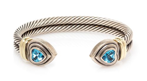 A Sterling Silver, 14 Karat Yellow Gold and Blue Topaz 'Double Cable Heart' Cuff Bracelet, David Yurman, 29.25 dwts.