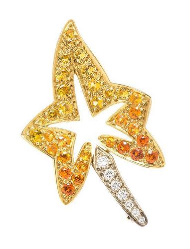 * An 14 Karat Gold, Multi Colored Sapphire and Diamond Leaf Brooch, 4.60 dwts.