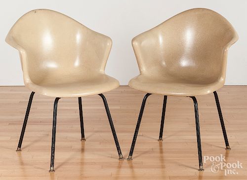 Pair of two mid-century modern fiberglass chairs