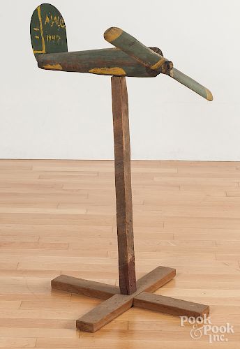 Painted wood and tin airplane weathervane fragment
