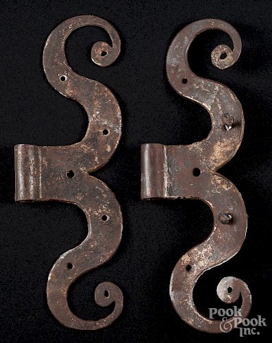 Pair of wrought iron ram's horn hinges
