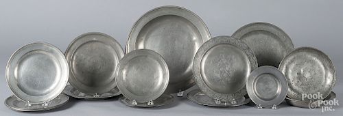 Fifteen Continental pewter plates and deep dishes