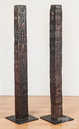 Pair of geometric carved architectural posts