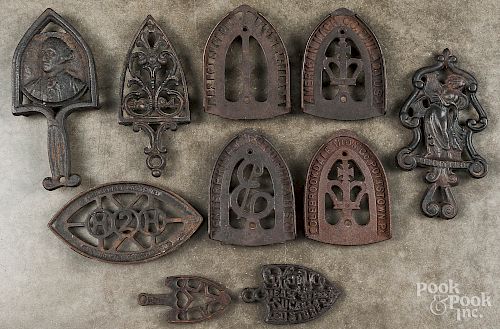 Collection of cast iron trivets.